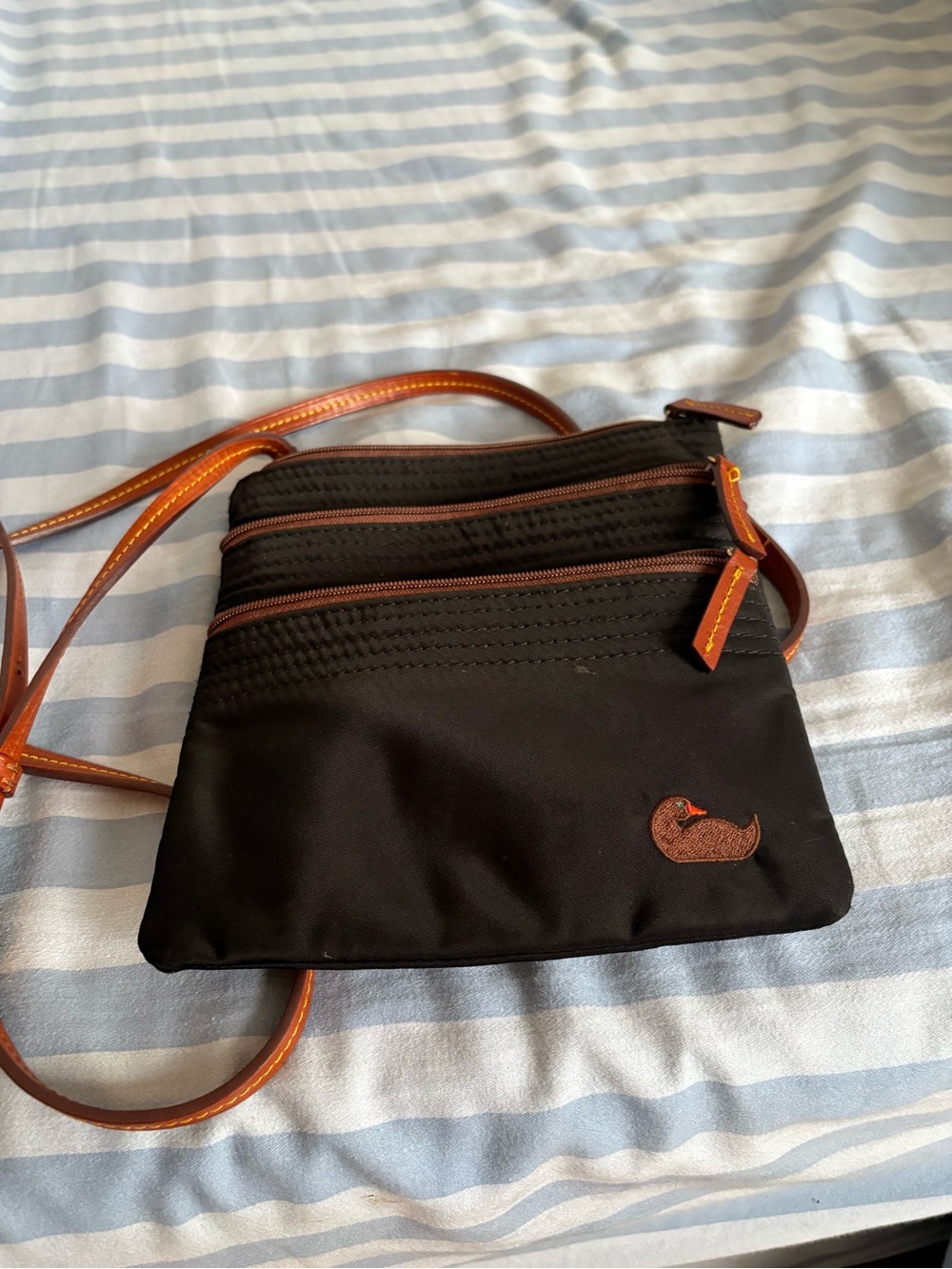 Dooney & Bourke Black Crossbody with Brown Trim and Duck Patch